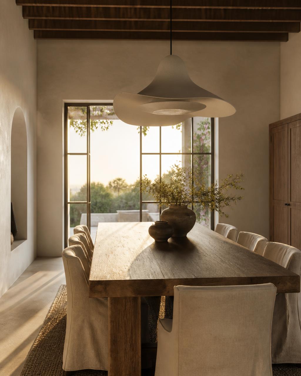Elegant dining room with oak table and sculptural pendant